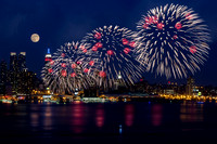 Fireworks and Full Moon Over New York City